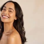 A woman smiling after IPL therapy in Jacksonville, FL